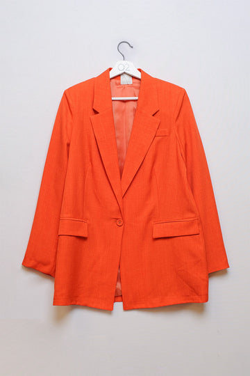 Q2 Blazer texturizado en naranja