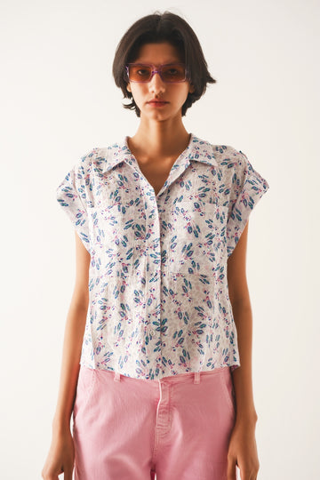 Q2 Blusa morada con bolsillos y estampado de florecitas